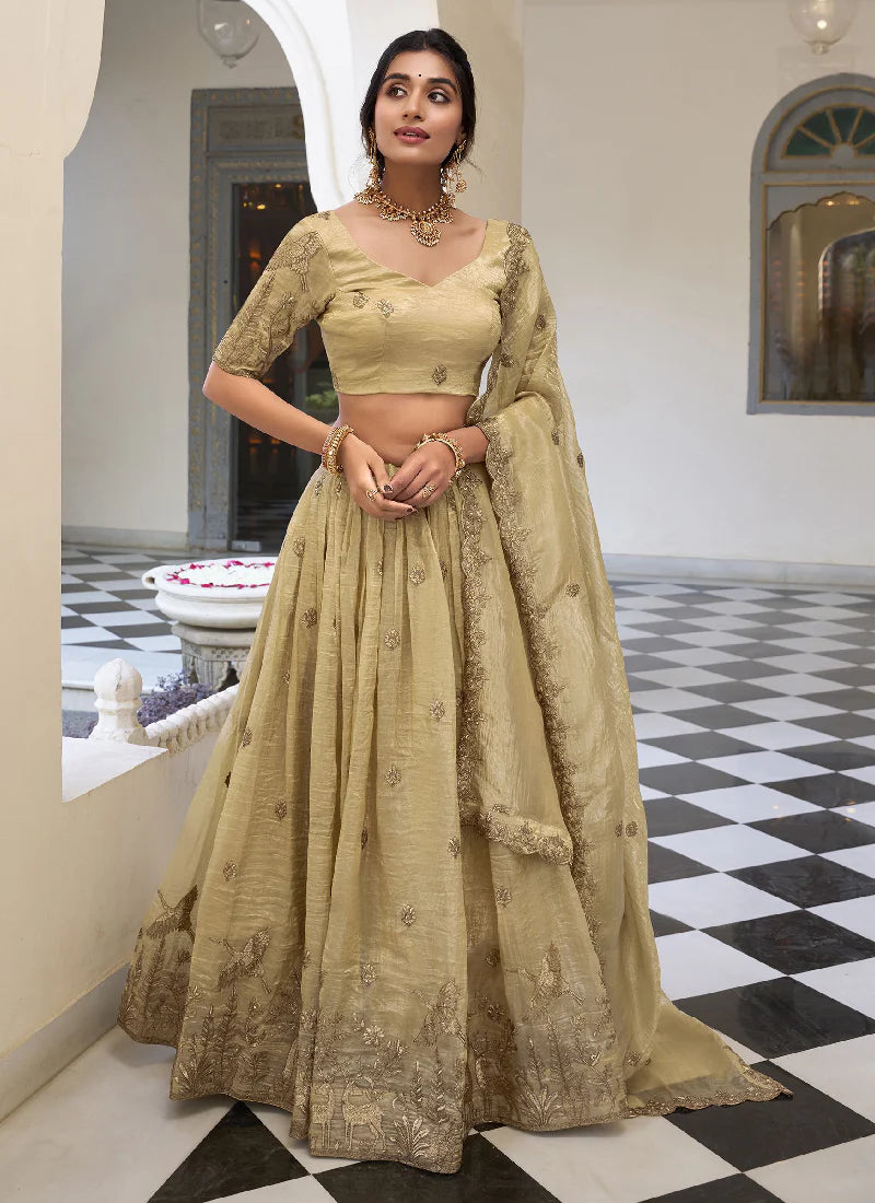 cream-colored lehenga choli with a matching dupatta