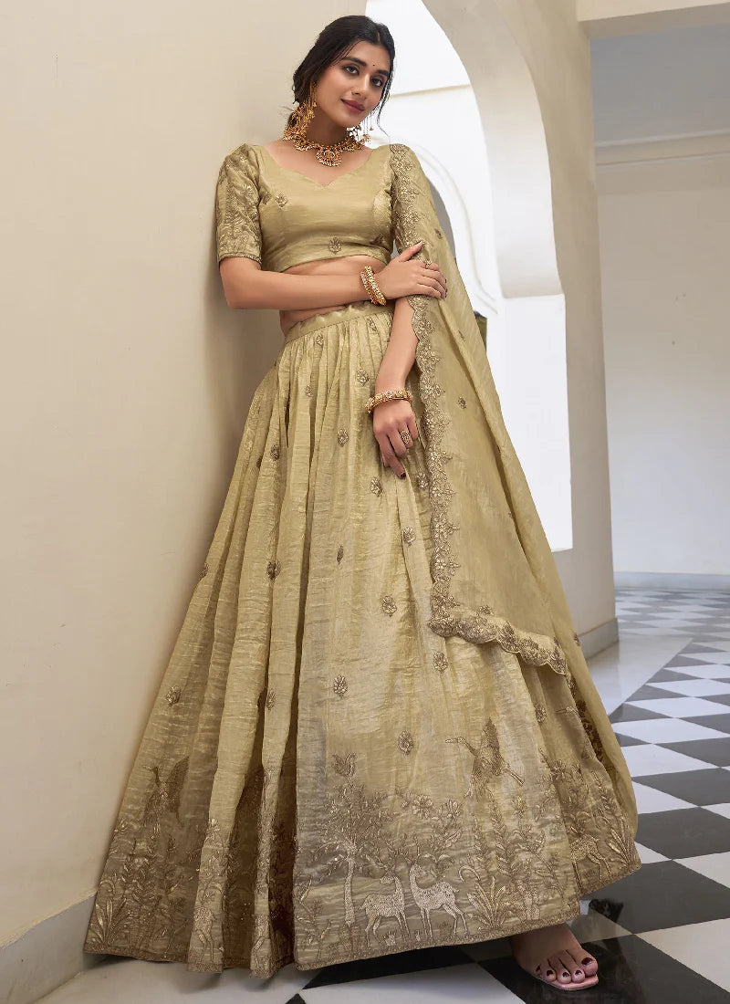 cream-colored lehenga choli with a matching dupatta