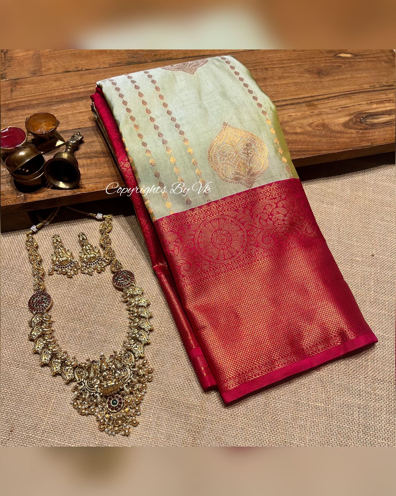 mesmerizing magenta long border with pastel green saree