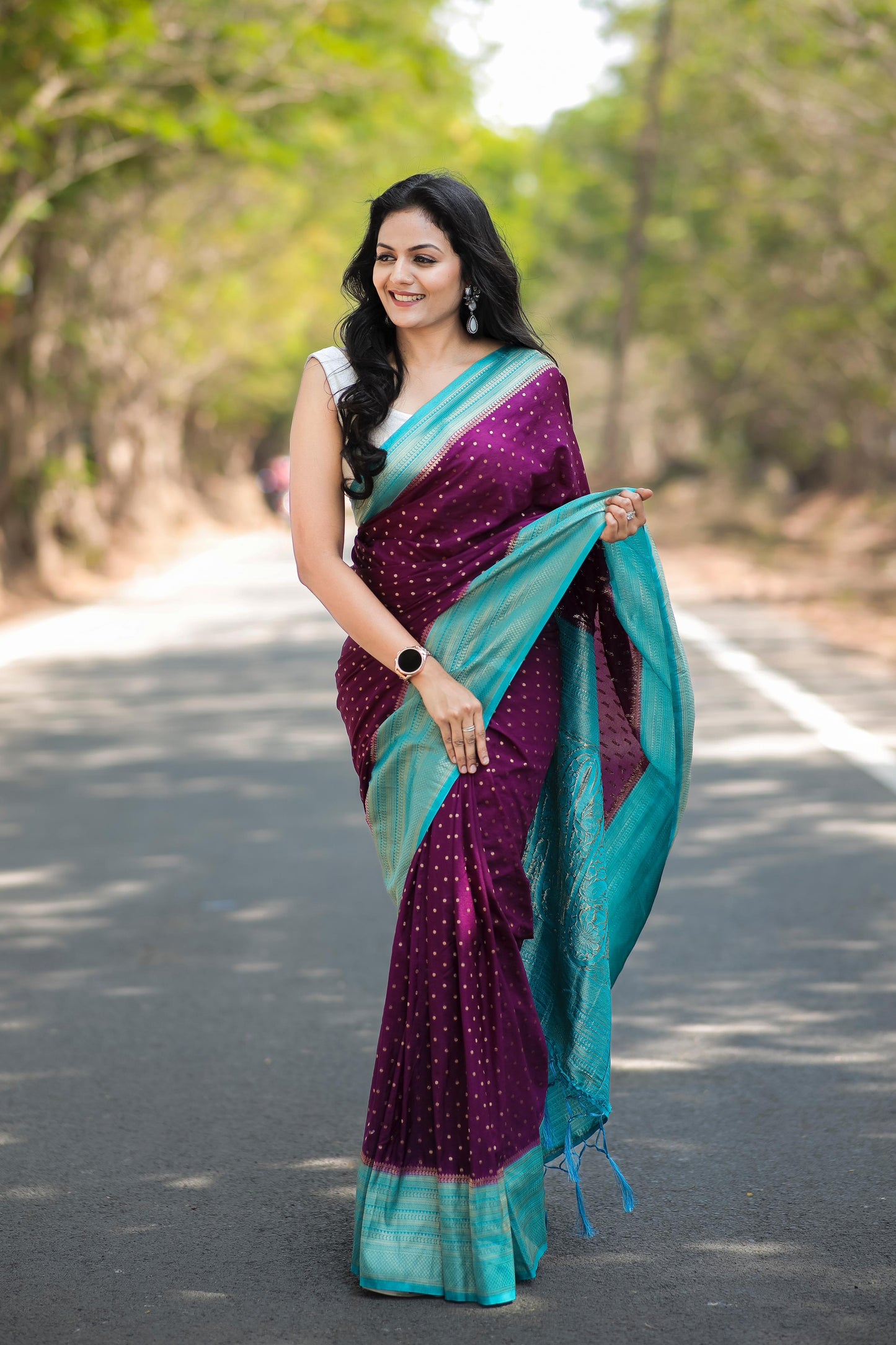 Plum purple with turquoise khadi georgette silk saree