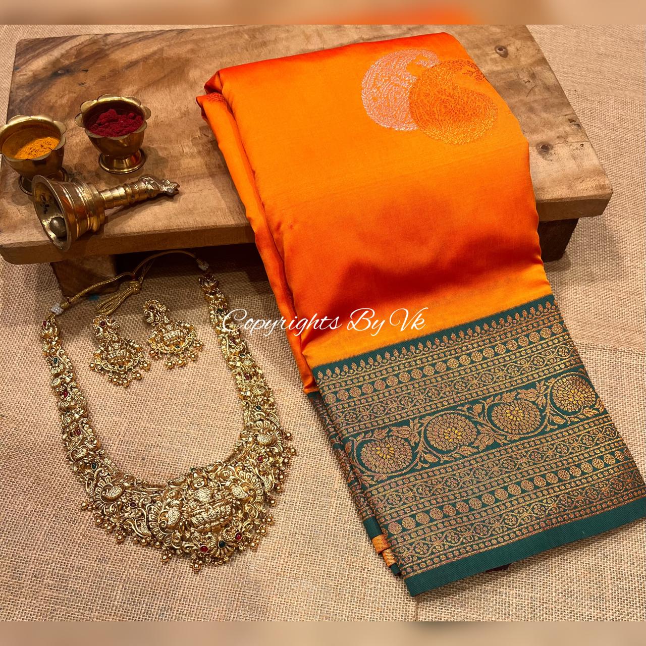 Mesmerising Orange Pattu saree