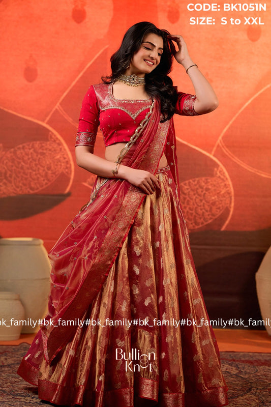 Amulya red Tissue Zari lehenga set is designed wedding lehenga in red