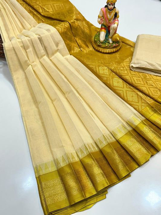 Beige and gold saree with a decorative border on a white background