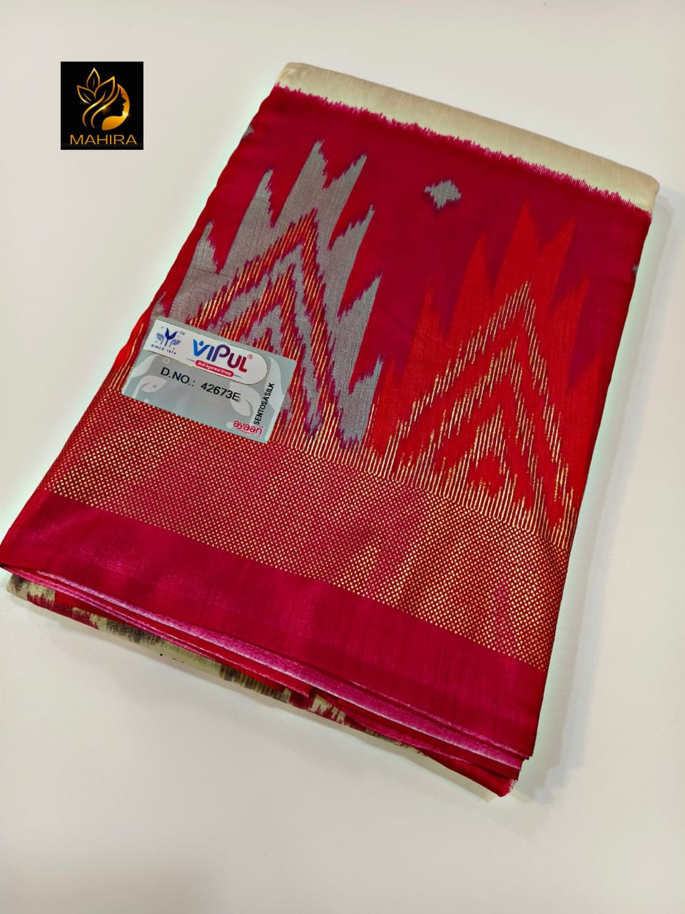 Ikkath style design dola silk saree in red an off white