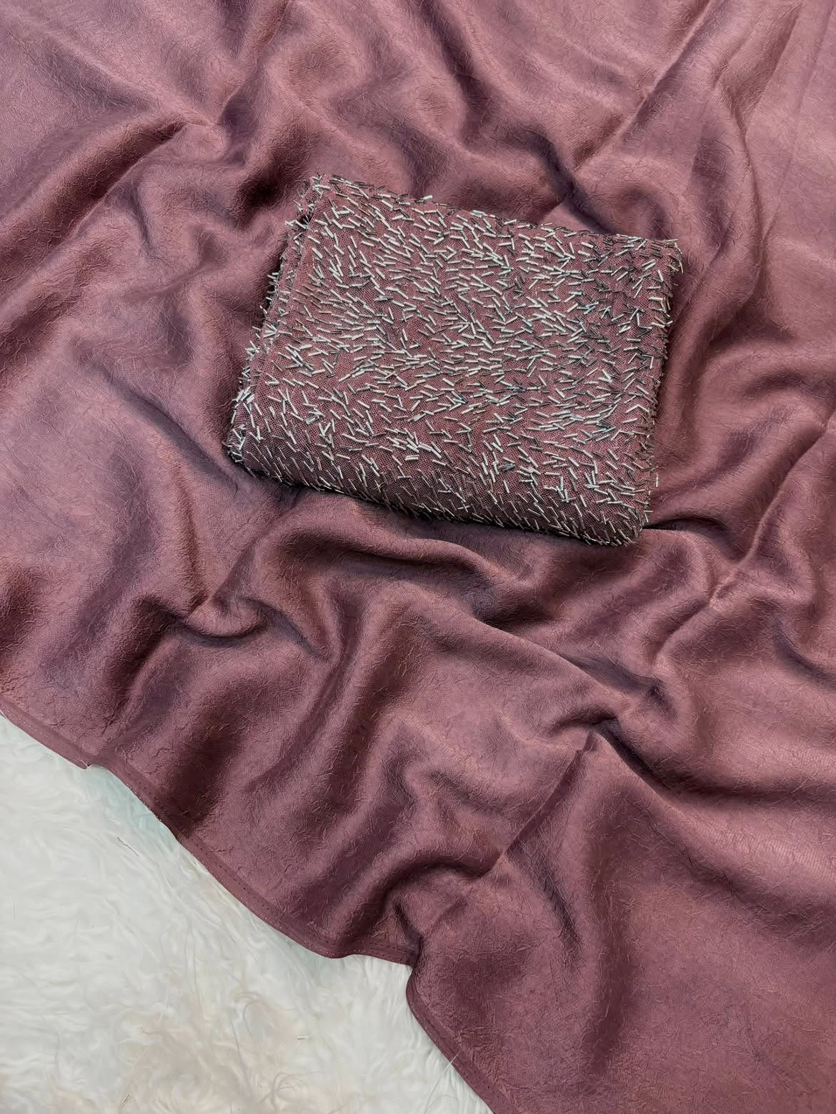Dusty rose saree with silver sequin work and matching blouse piece