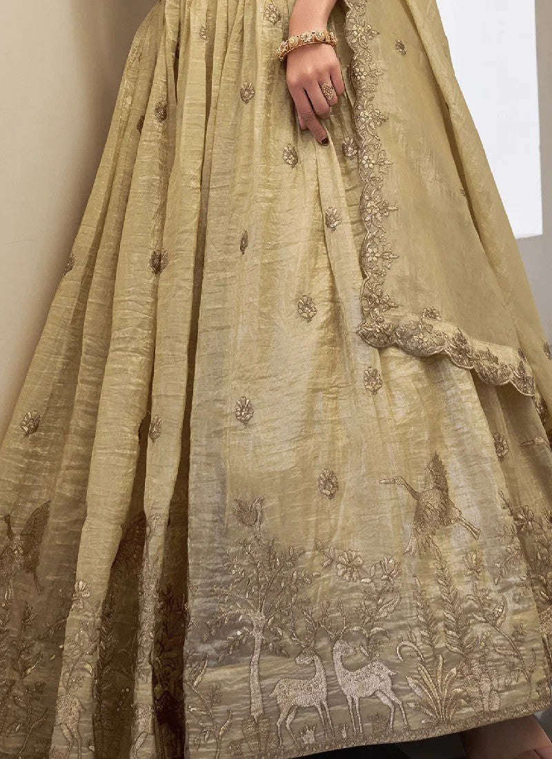 cream-colored lehenga choli with a matching dupatta