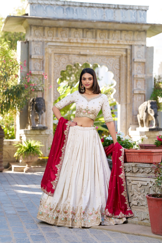 White and red lehenga choli with a matching dupatta