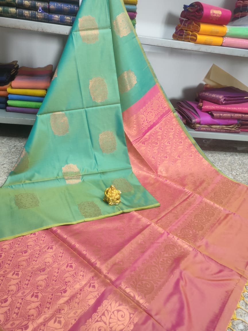 Turquoise and peach pink soft silk saree