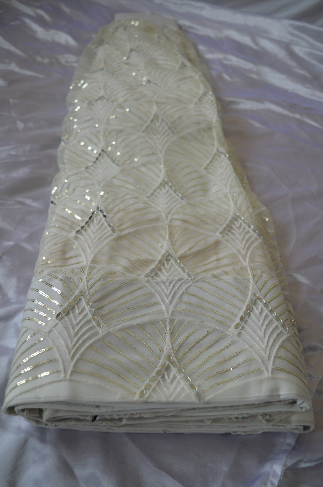 Opulent White Embroidered Net Lehenga Choli