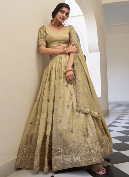 cream-colored lehenga choli with a matching dupatta