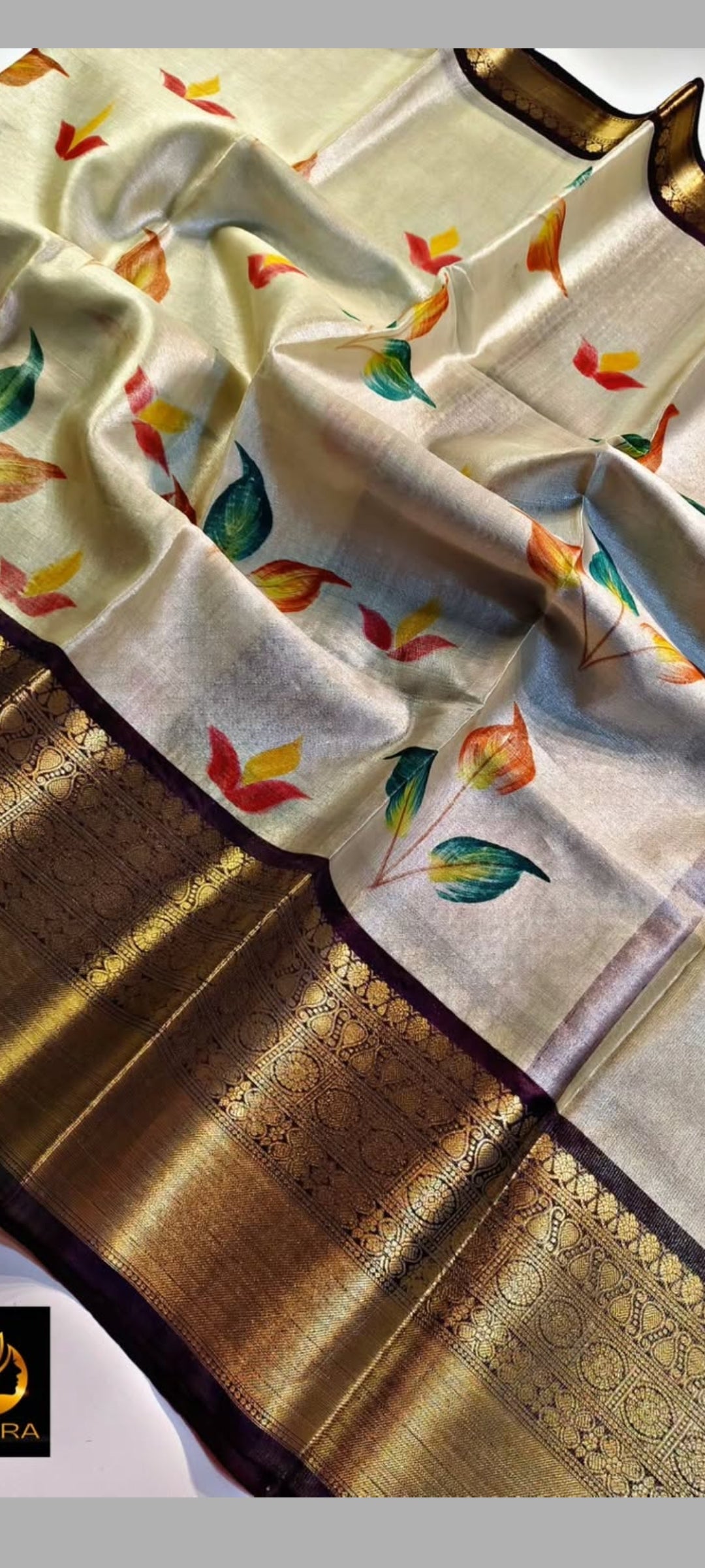 Saree with leaf pattern and gold border