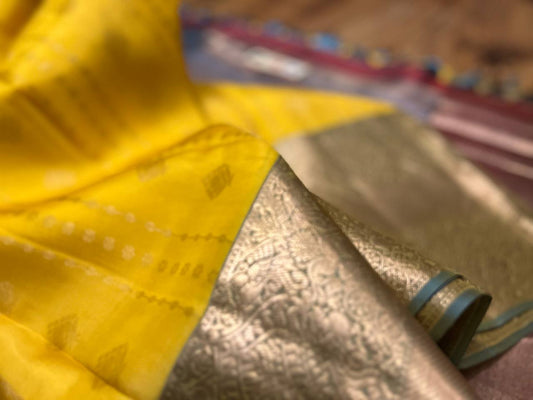 Bright yellow saree kanchipuram saree