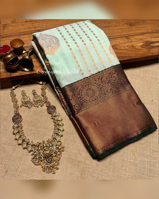 Copper border Green saree