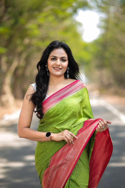 Apple green with Rani Pink khadi georgette silk saree