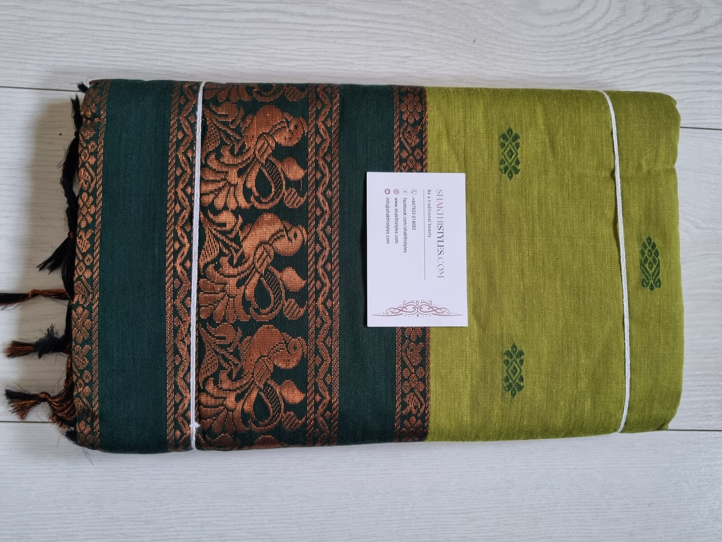 Folded fabric with decorative patterns on a wooden surface