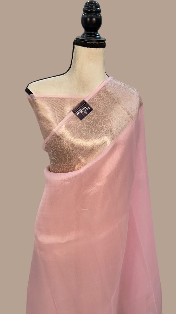 Soft pink Banarasi tissue saree with woven gold border