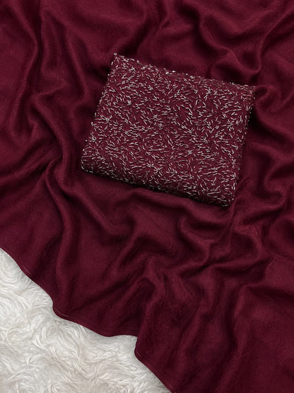 Burgundy saree with silver sequin work and matching blouse piece