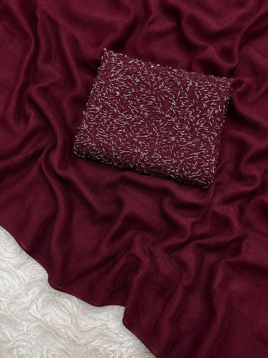 Burgundy saree with silver sequin work and matching blouse piece