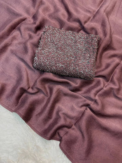 Dusty rose saree with silver sequin work and matching blouse piece