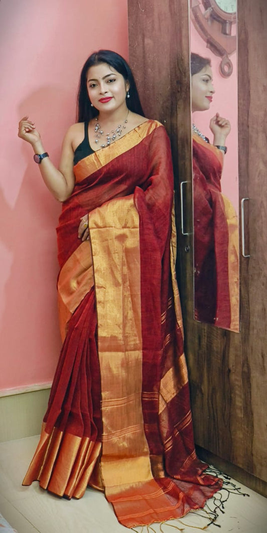 Red and zari border linen saree