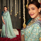 Greenish dola silk saree with a touch of silver work